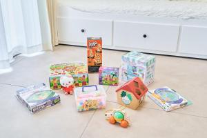 a group of toys in boxes on the floor at LEGOLAND 近くの一軒家Nagoya Cozy Nest House in Shimono-ishikichō +21 photos