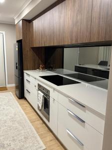 Foto sihtkohas Karaka asuva majutusasutuse Pet Friendly Riverfront Minimalist Karaka Stay Prime Location galeriist