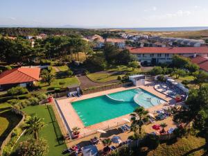 an aerial view of a swimming pool at a resort at Belambra Clubs Capbreton - Les Vignes in Capbreton