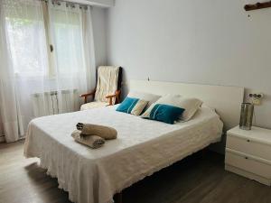 Ένα ή περισσότερα κρεβάτια σε δωμάτιο στο Espaciosa y Luminosa