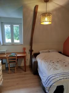 Katil atau katil-katil dalam bilik di Chambre tout confort, au calme