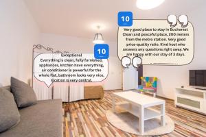 a living room with a couch and a table at Urban Retreat Near Metro & Mega Mall in Bucharest