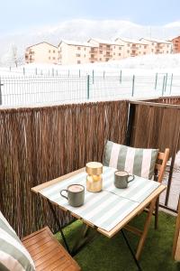 Balkón nebo terasa v ubytování Famili'ski - Votre cocon familial aux Angles