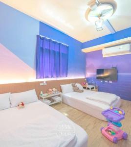 Ένα ή περισσότερα κρεβάτια σε δωμάτιο στο We Smile B&B