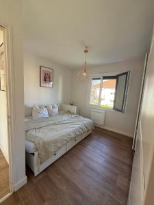 Postel nebo postele na pokoji v ubytování appartement cosy poitiers université