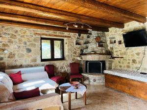 TV a/nebo společenská místnost v ubytování Fos Guesthouse