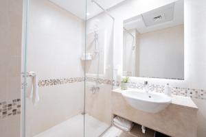 Koupelna v ubytování Modern Studio Living by Voyage + 14 fotografií