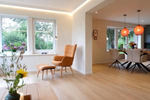 Χώρος καθιστικού στο Ferienhaus Landliv Hus
