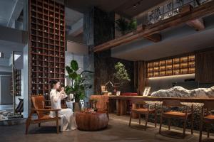 Χώρος καθιστικού στο Zhangjiajie SANHE Hotel