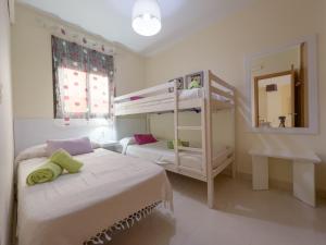 Postel nebo postele na pokoji v ubytování Apartamento Cala Bajo