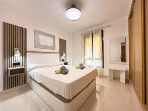 Postel nebo postele na pokoji v ubytování Apartamento Cala Bajo