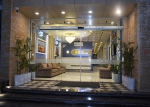 a lobby with couches and chairs in a building at Hotel Imperial in Dabok