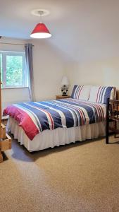 a bedroom with a large bed in a room at 5 Bed in Mountcharles oc-ii11344 in Mountcharles