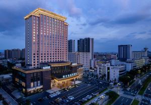 a view of a city with a tall building at SINOKAI International Hotel in Dongguan