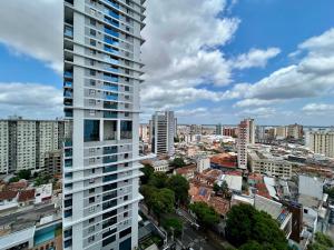 a view of a city with a tall building at Iara & Muira Apartments in Belém