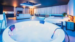 Ένα ή περισσότερα κρεβάτια σε δωμάτιο στο Suite Soma