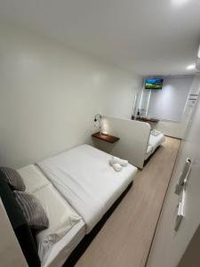 Ένα ή περισσότερα κρεβάτια σε δωμάτιο στο LM Motel