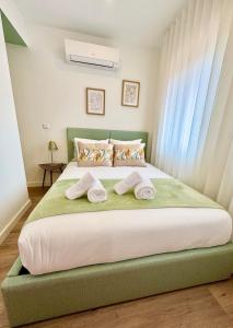 Postel nebo postele na pokoji v ubytování Loving Porto Cozy Flat by MyMoradia