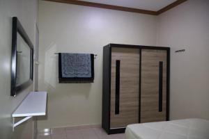 Et tv og/eller underholdning på AFEL Homestay + 4 billeder