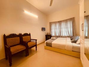 Ένα ή περισσότερα κρεβάτια σε δωμάτιο στο Luxura Heaven