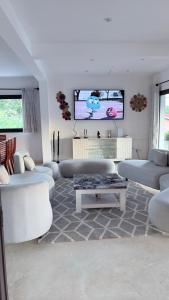 Μια τηλεόραση ή/και κέντρο ψυχαγωγίας στο Villa Fitiavana
