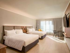 En eller flere senge i et værelse på Novotel Santiago Las Condes + 100 billeder
