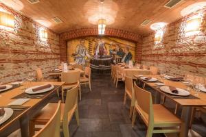 Reštaurácia alebo iné gastronomické zariadenie v ubytovaní Hostal Albany