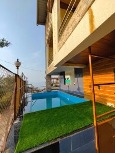 an image of a swimming pool in a house at 7 Hill Stays in Panchgani