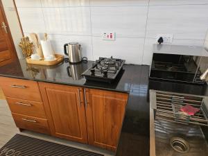 Kuchyň nebo kuchyňský kout v ubytování LG Homes Dodoma + 8 fotografií