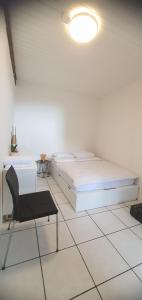 Postel nebo postele na pokoji v ubytování Grec Zimmer