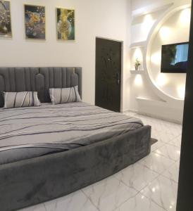 Postel nebo postele na pokoji v ubytování PK'S Luxury Apartments