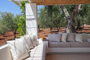 Et opholdsområde på TD Casa Lulù Panoramic Pool Over Mediterranean Scrub