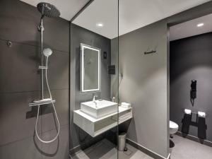 Koupelna v ubytování Novotel Sharjah Expo Centre + 167 fotografií