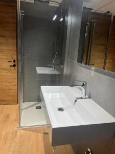 Bilik mandi di Garden Park Le Albere Trilocale con Balcone