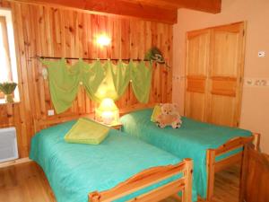 Postel nebo postele na pokoji v ubytování Chambre D'hôtes Myrtille