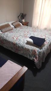 Ένα ή περισσότερα κρεβάτια σε δωμάτιο στο Casa en parcela