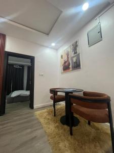 Ένα ή περισσότερα κρεβάτια σε δωμάτιο στο Modern 1 Bedroom Apartment in Lekki with Pool Gym Constant Power and Wi-Fi