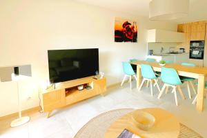 Køkken eller tekøkken på Duplex Marina Di Cala Rossa