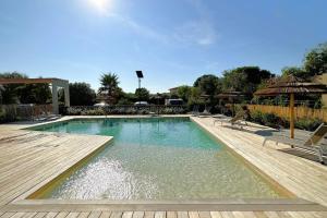 Swimmingpoolen hos eller tæt på Duplex Marina Di Cala Rossa