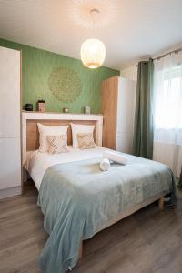 Ένα ή περισσότερα κρεβάτια σε δωμάτιο στο Le Casa Délia +31 φωτογραφίες