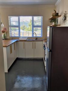 Køkken eller tekøkken på Fortune Cottage