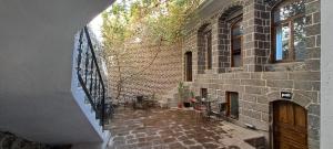 a brick hallway of a building with a brick wall at Ava House in Diyarbakır