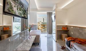 a living room with a couch and a table at Hotel Sporting in Rimini