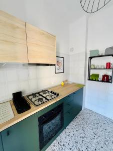 Η κουζίνα ή μικρή κουζίνα στο Ca' Montello Apartment