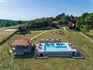 an aerial view of a swimming pool in a field at Ozoni & Spa in Sopot
