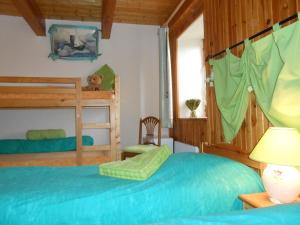 Postel nebo postele na pokoji v ubytování Chambre D'hôtes Myrtille