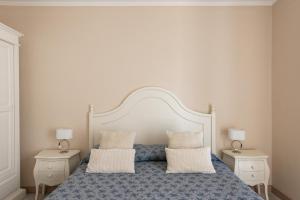 Ένα ή περισσότερα κρεβάτια σε δωμάτιο στο Luxury Suite in Villa near Rome and Ostia +18 φωτογραφίες