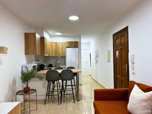 Η κουζίνα ή μικρή κουζίνα στο Rincón cálido +4 φωτογραφίες