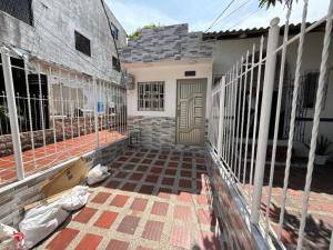 a house under construction with the front door open at Apartamento Montecristo in Barranquilla