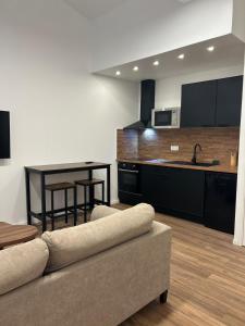 Køkken eller tekøkken på Cozy room apartment Nîmes Centre Coupole Arènes